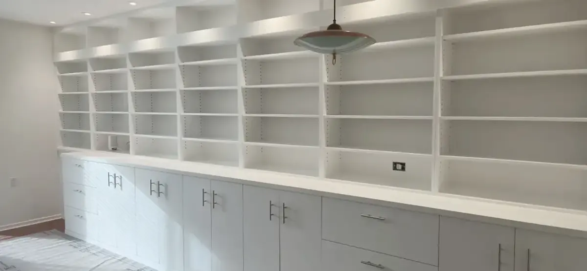 White painted built-in cabinets and shelving with a smooth, even finish